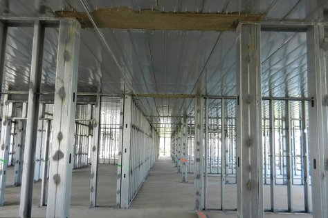 Slab Beams Across Corridor