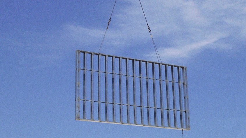 Flying a Wall Panel into Place